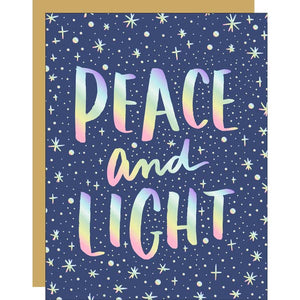 Blue card with holographic text saying, “Peace and Light”. Images of white stars in background. A brown envelope is included.