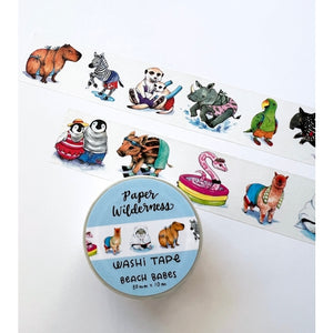 White tape with images of various animals ready for the beach. Animals include zebra, rhino, green parrot, llama, penguin, pink snake, and a pig in a repeating pattern.