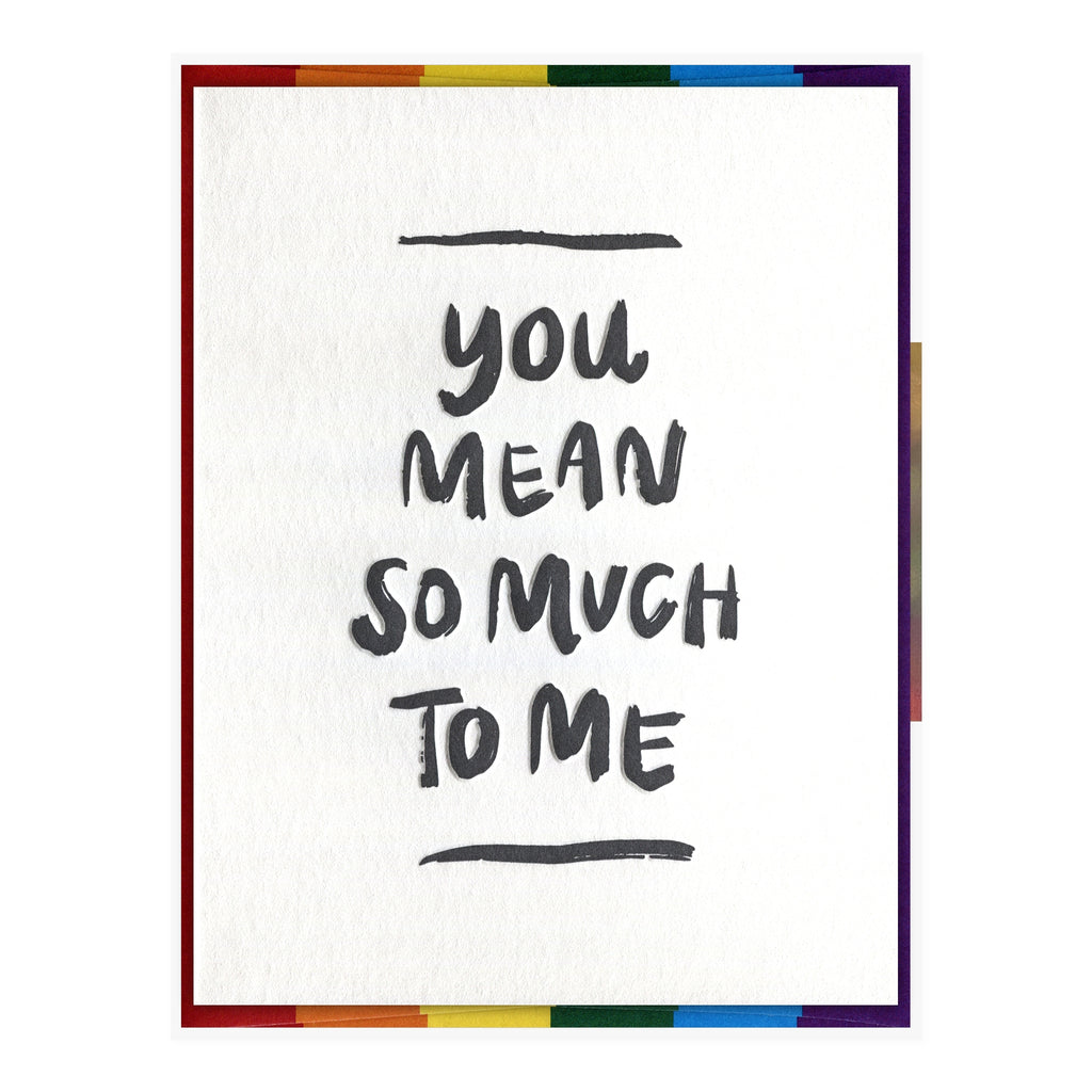 White card with blue text saying, “You Mean So Much To Me”. A rainbow striped envelope is included.