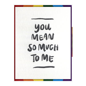 White card with blue text saying, “You Mean So Much To Me”. A rainbow striped envelope is included.