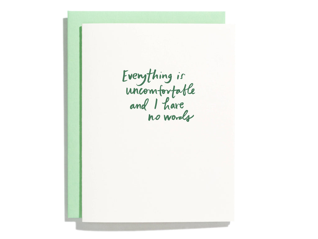 White card with green script text saying, “Everything is Uncomfortable and I Have No Words”. A light green envelope is included.
