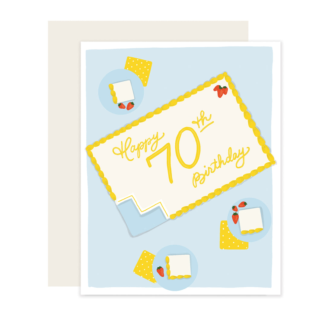 White card with blue inset background with image of a white sheet cake with yellow frosting saying, “Happy 70th Birthday” with a few pieces cut out of the corner. Missing pieces on blue plates with yellow napkins and red strawberries. An ivory envelope is included.