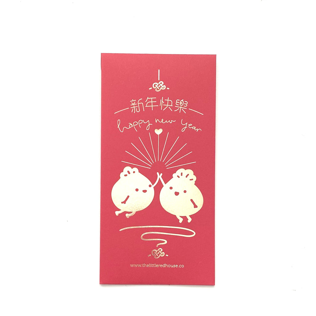 Red envelope with gold foil with Chinese characters, foil text says, "Happy new year" and two bao buns are high fiving.