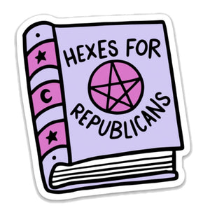 Image of a large book in lavender with bright pink accents. Bright pink star in middle of book with black text that says “Hexes for republicans”.