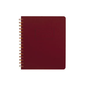 Image burgundy cover with letter pressed text says, “Name” and “Date” with lines for writing in a rectangle. Coiled binding on left side.
