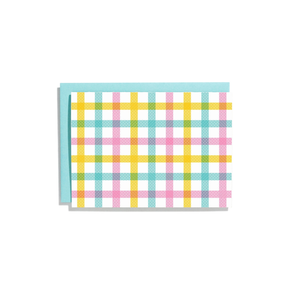 Image of notecard with yellow, pink and blue plaid background and blue envelopes. 