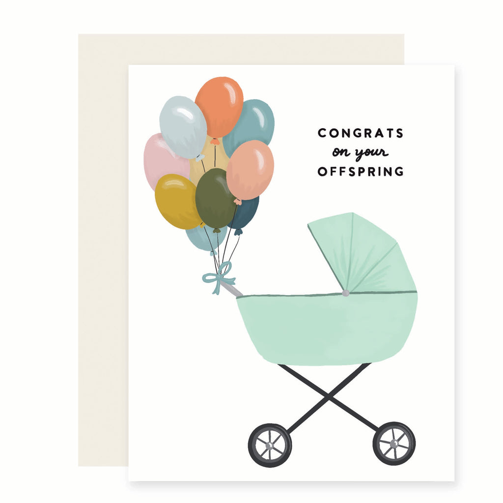 White card with black text saying, “Congrats on Your Offspring”. Images of a green baby buggy with a bouquet of colorful balloons tied to it. A white envelope is included.