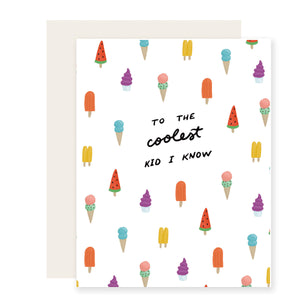 White card with black text saying, “To The Coolest Kid I Know”. Images of various types of ice cream cones and popsicles scattered across card. An ivory envelope is included.