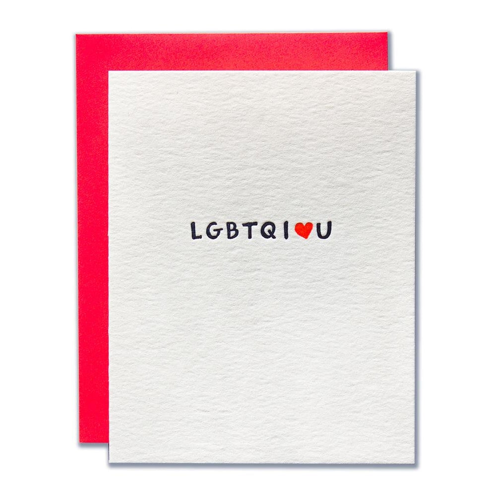 White card with back text saying, "LGBTQ I Love U". Image of a red heart is replacing the word love in the text. A red envelope is included.