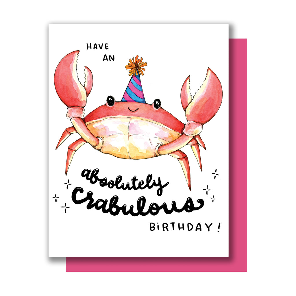 White card with black text saying, “Have An Absolutely Crabulous Birthday!”  Image of a large red crab wearing a purple and blue birthday party hat. A pink envelope is included.