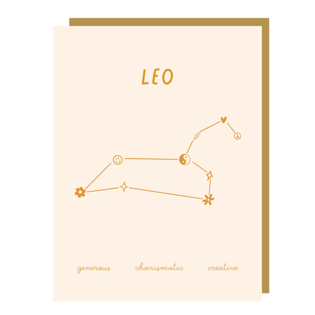 Ivory card with gold text saying, "Leo Generous Charasmatic Creative". Image of the Leo Zodiac symbol. A gold envelope is included.