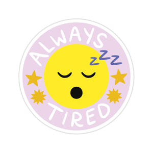 Image of a yellow circle with a yawning face with a pale lavender border with white text says, “Always tired” and purple text says, “ZZZ”.          