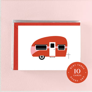 Image of white background notecard with image of camper in red and pink. Red envelopes included. 