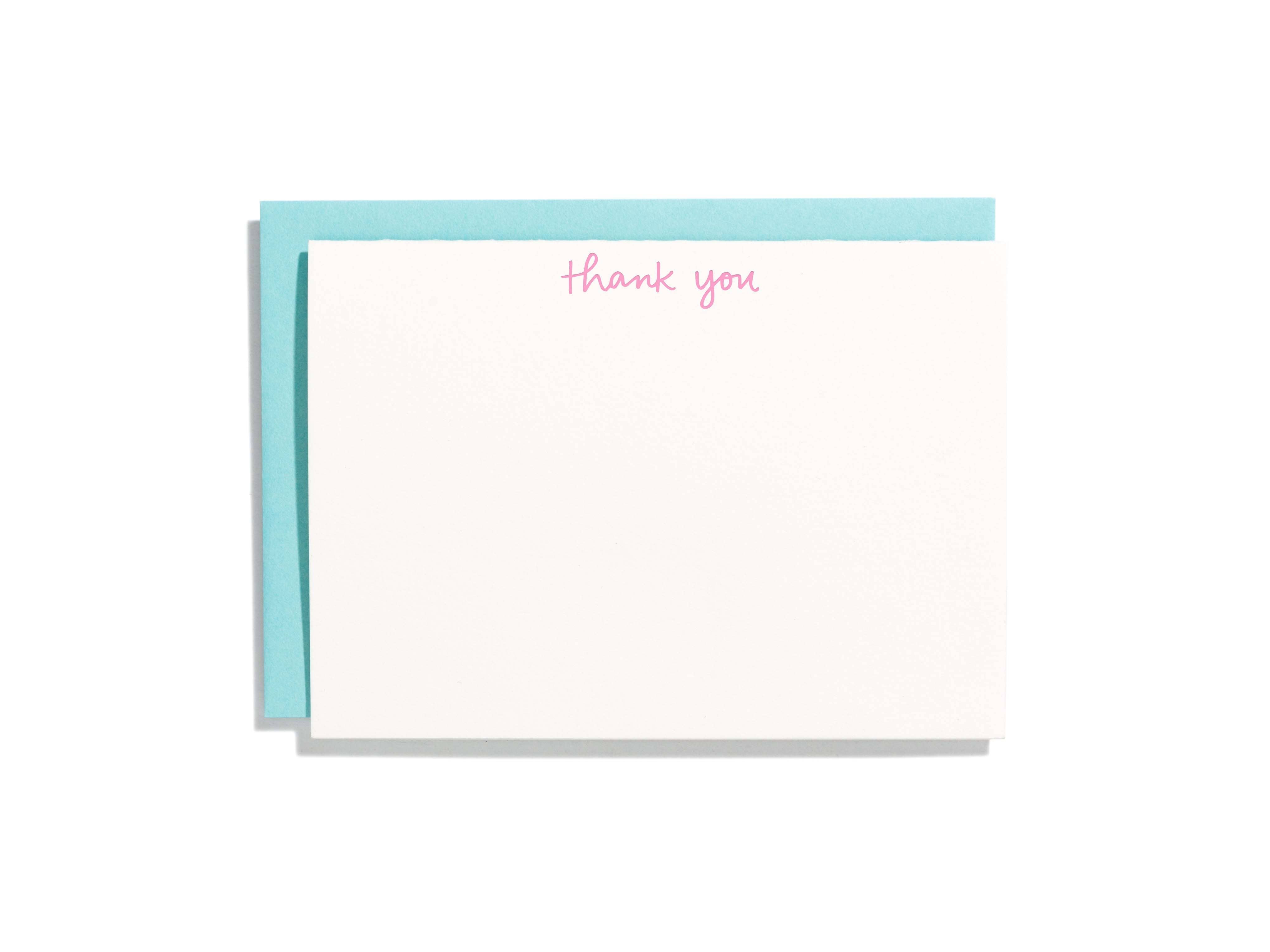 Ivory background with pink text at top of card says, “Thank you”. Aqua envelopes included. 