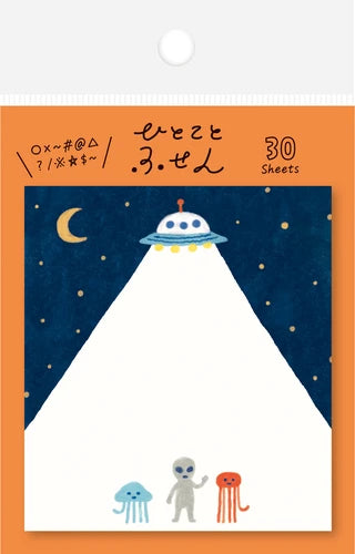 sticky notes witha design of a UFO beaming up 3 small aliens
