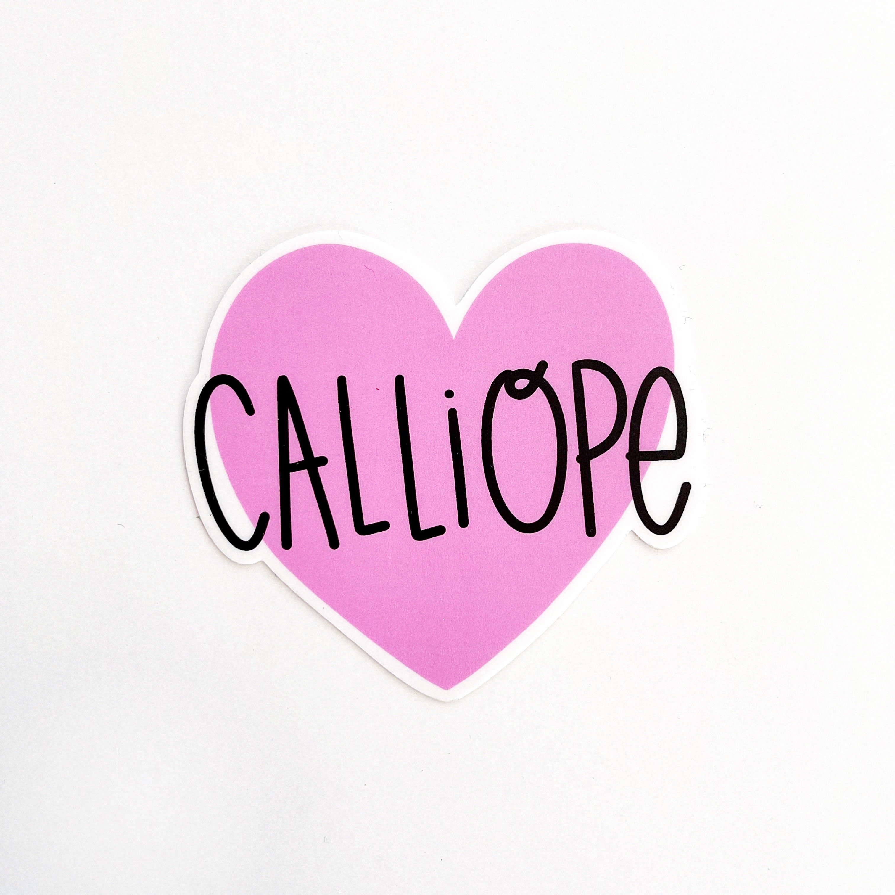 Image of sticker with pink heart with black text says, "Calliope". 