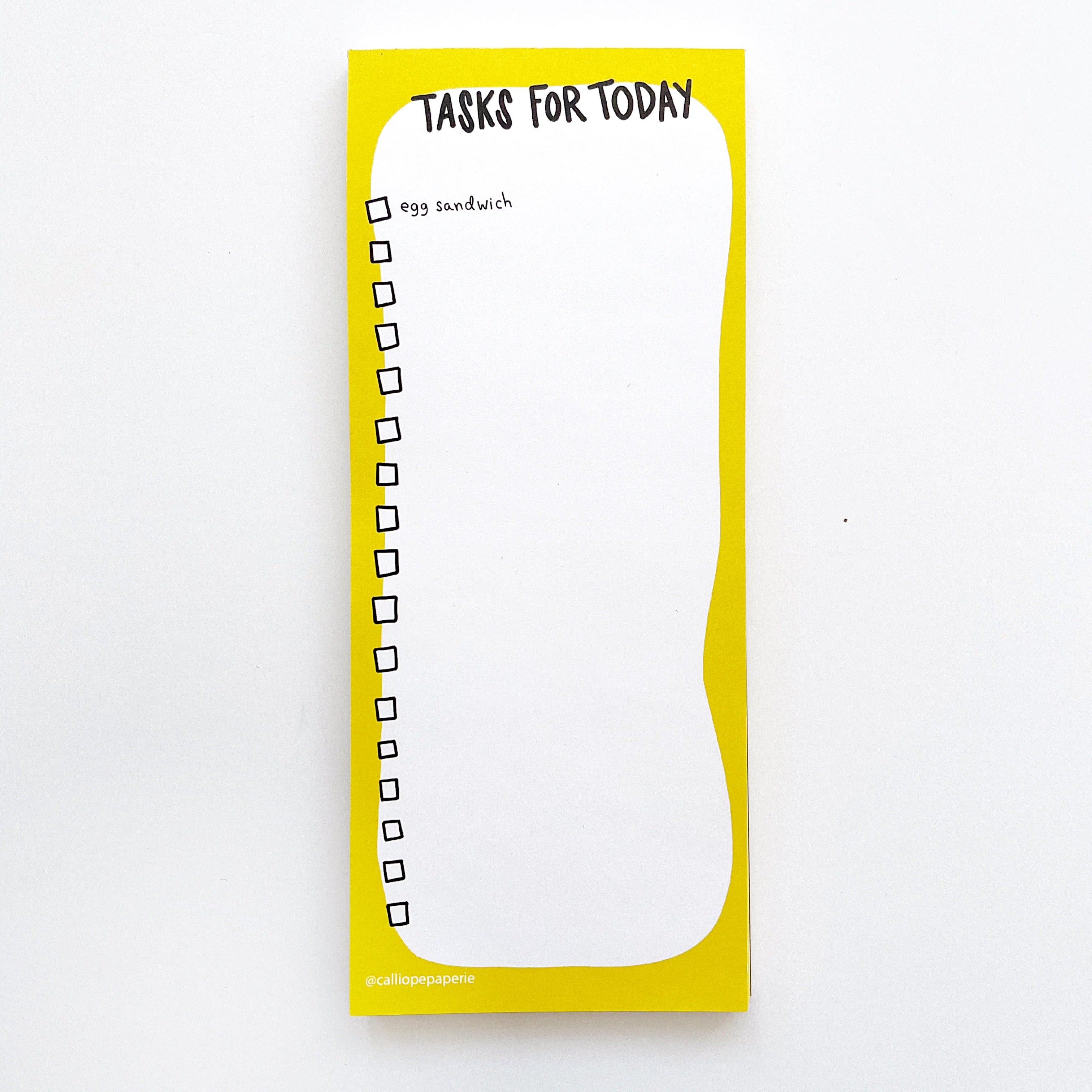 image of notepad with white background with bright yellow border. Black text says, "Tasks for today" and includes checkboxes with text saying, "egg sandwich". 