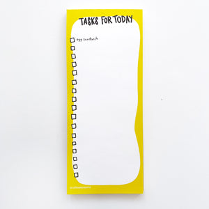 image of notepad with white background with bright yellow border. Black text says, "Tasks for today" and includes checkboxes with text saying, "egg sandwich". 