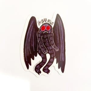 Image of Mothman in black with red eyes and black text says, “I’m bad news”. 