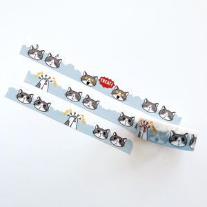 Image of Washi tape with blue and white background with images of grey and white carts. 