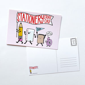 Image of postcard with pink background and images of stationery store day parade of characters, reverse side of postcard has white background and black lines for address on right and blank are on left for messages.