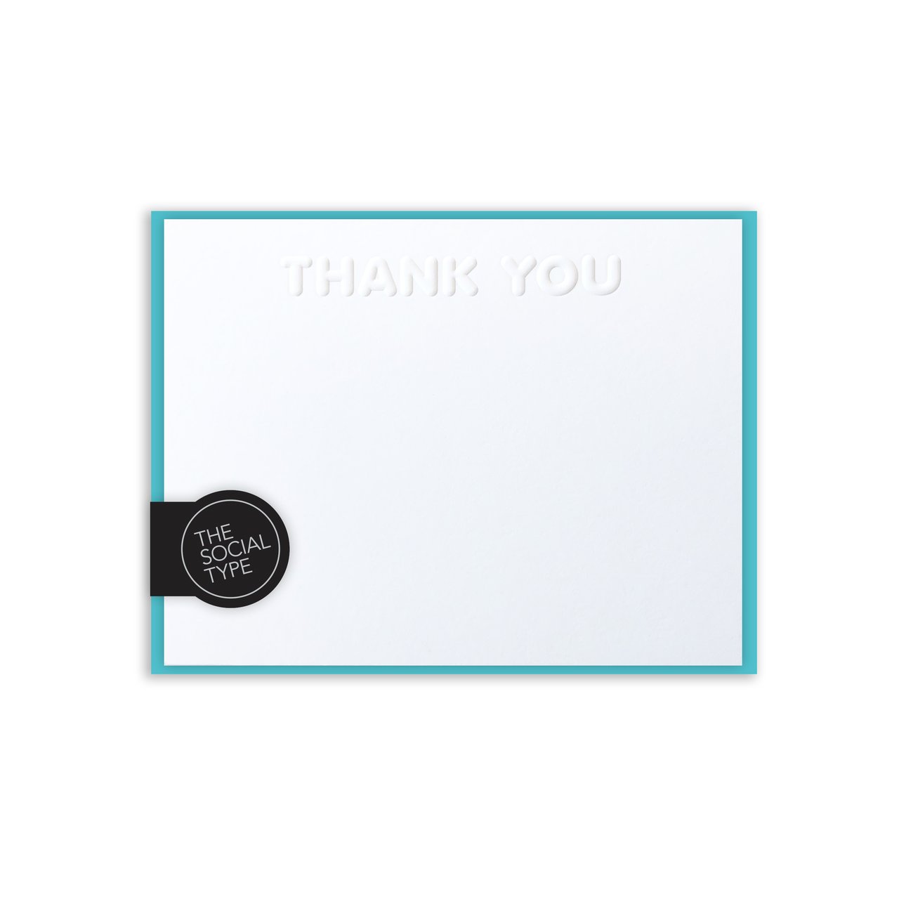 Image of white notecard with embossed "thank you" and aqua envelopes. 