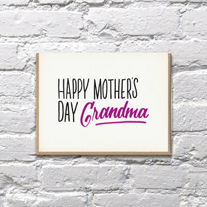 White card with black and purple text saying, “Happy Mother’s Day Grandma”. A gray envelope is included.