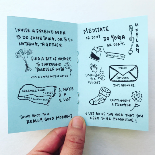 Image of two pages of zine with blue background and black text says “Invite a friend over to do something, or to do nothing, together”, “meditate or don’t do yoga or don’t”, “compliment a stranger”, and “let go of the idea that you need to be productive:.  