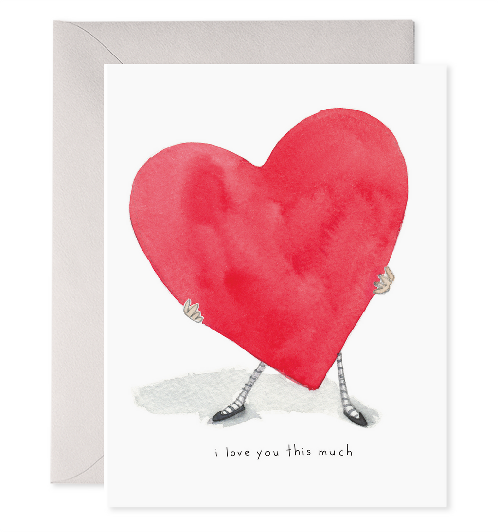 White card with black text saying” I Love You This Much”. Image of a red heart with outstretched arms and legs. A purple envelope is included.