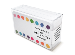 Image of a box of little notes. Image of little note has a border at the top and bottom of rainbow dots in pink, red, orange, yellow, green, blue, and purple. 