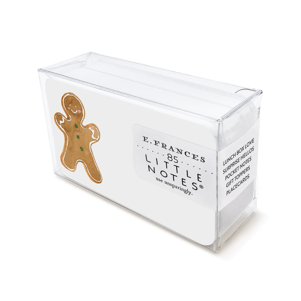 Image of a box of little notes. Card has a white background with image of a gingerbread person on the left side of the card.  