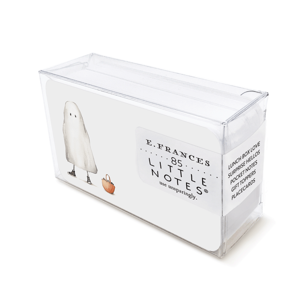 Image of a box of little notes. Note has a white background with an image of a person dressed as a ghost wearing black sneakers on the left side and a backet of candy.  