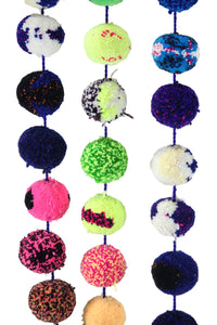 Image of multicolored pom pom garlands. 