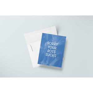 Blue marbled card with white text saying, “Sorry Your Boss Sucks”. A white envelope is included.