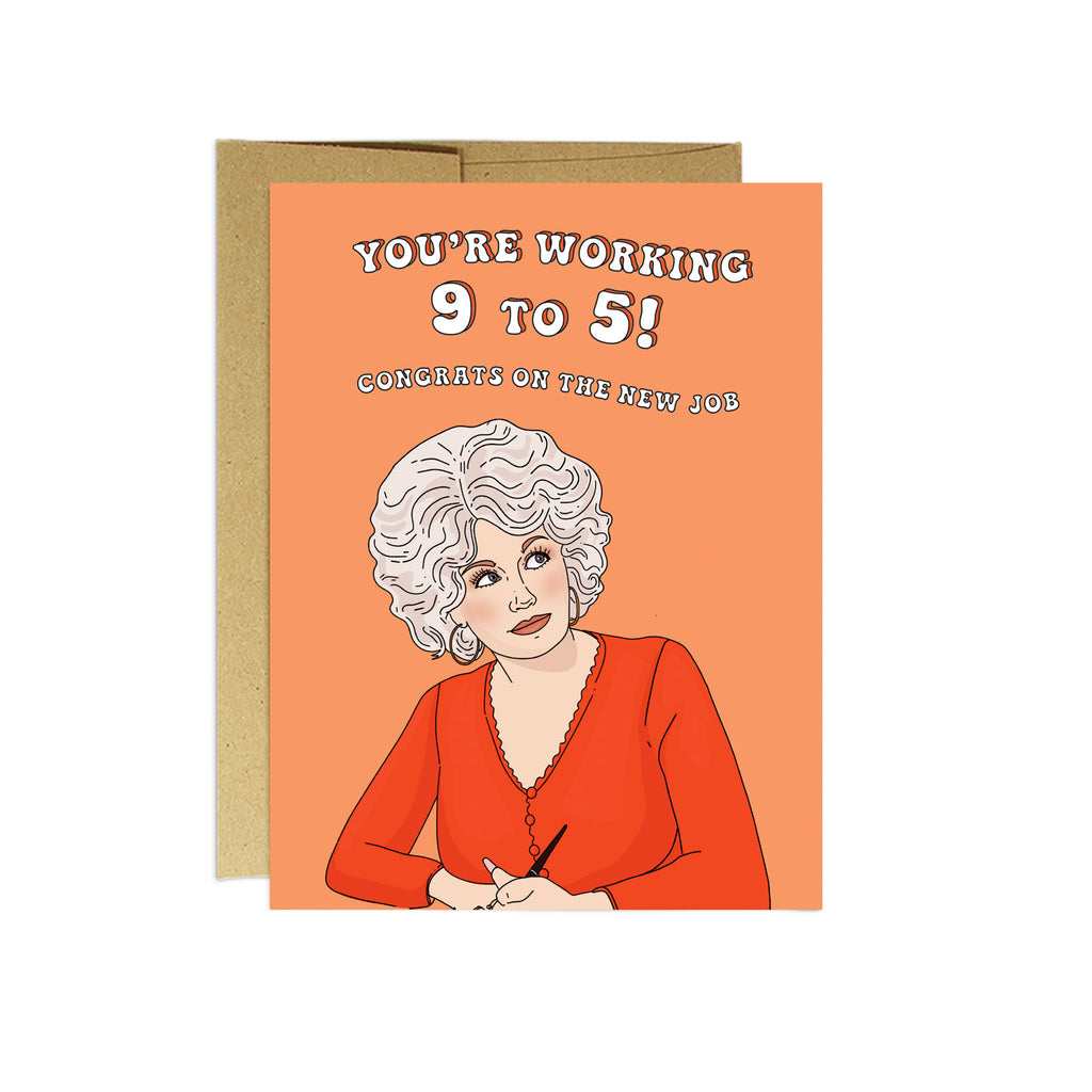 Orange card with white text saying, “You’re Working 9 to 5! Congrats on the New Job”. Image of actress Dolly Parton in center of the card. A brown envelope is included.