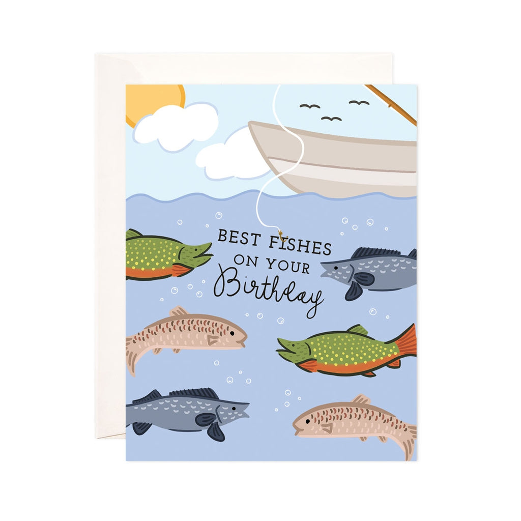 Blue card with black text saying, “Best Fishes On Your Birthday”. Images of several fish underwater with a boat and fishing rod. A white envelope is included.