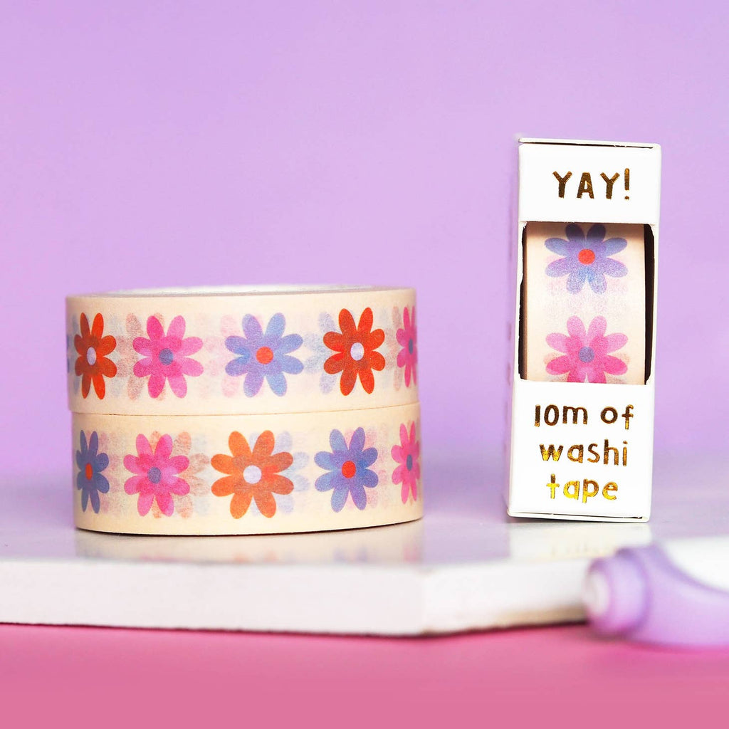 Decorative tape with ivory background with images of blue, red, pink and orange daisy flowers.