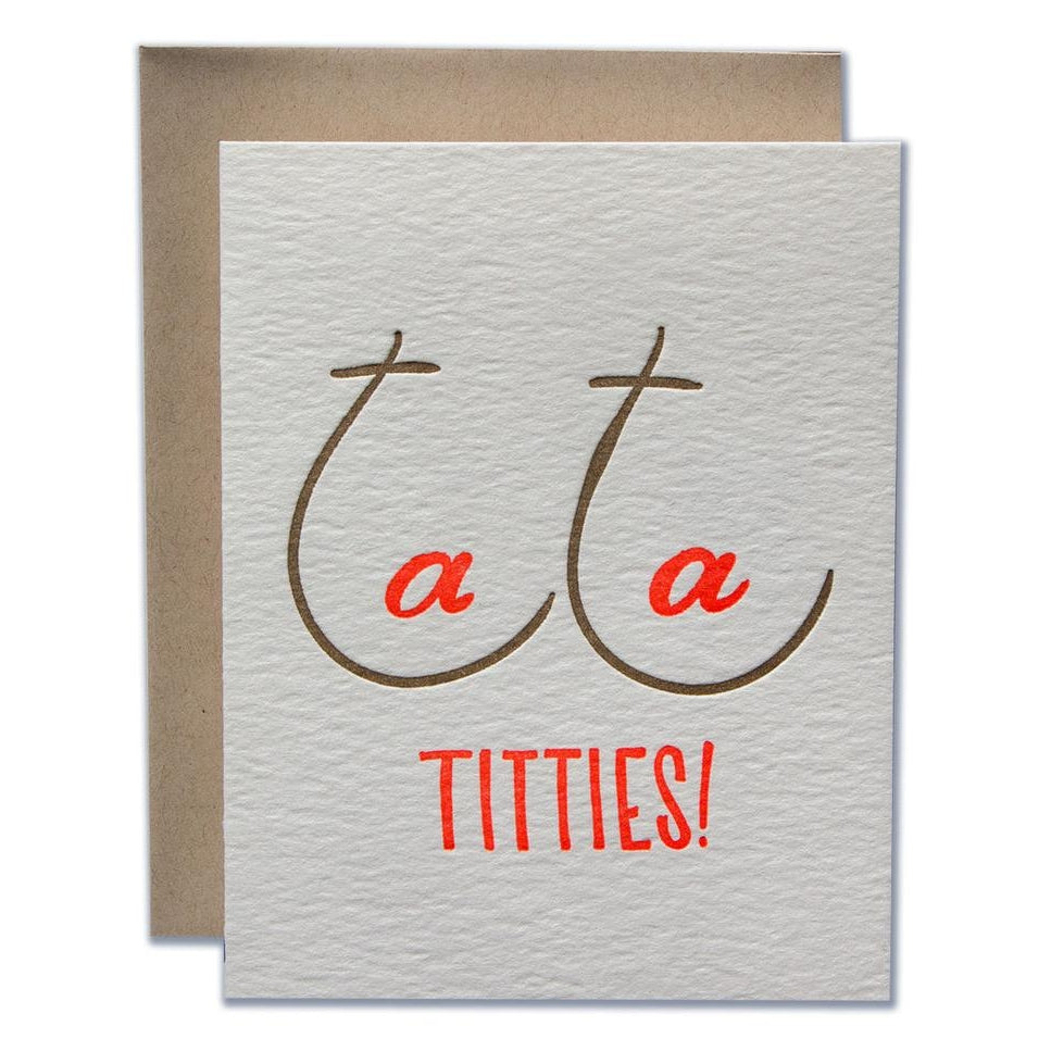 Gray card with gold and orange text saying, "Ta Ta Titties!" Images of the word Ta Ta shaped to resemble a pair of breasts.  A brown envelope is included.
