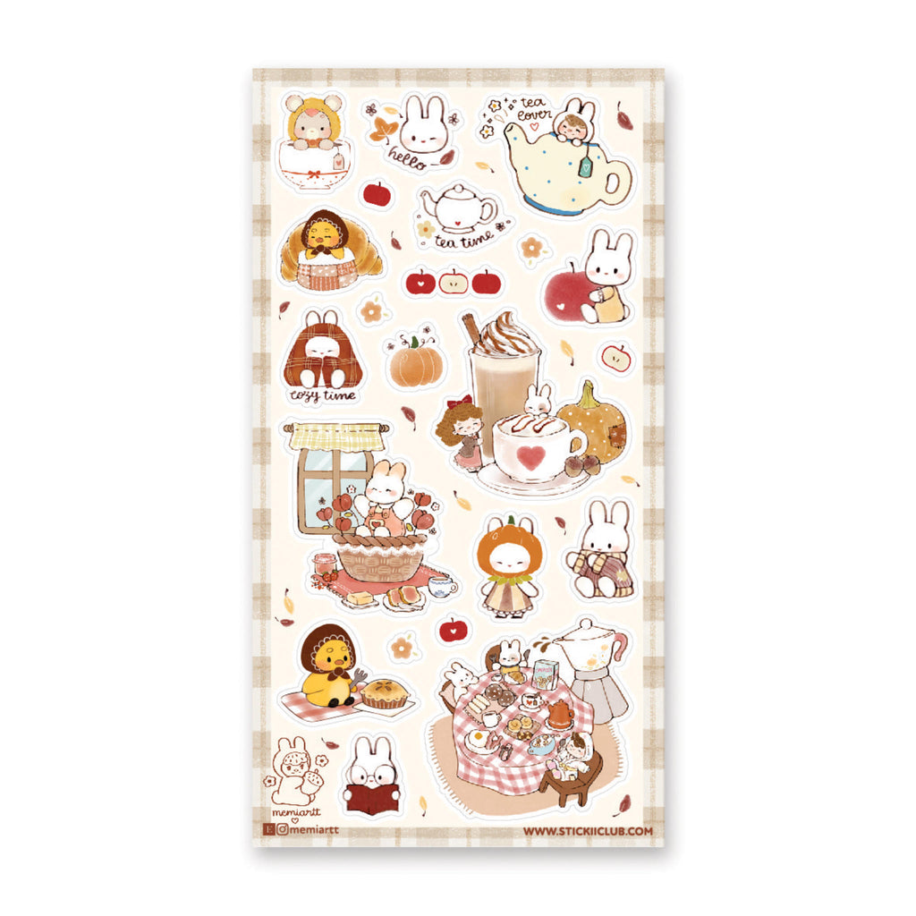 White green background with images of bunnies, kitties and chick with tea in green, tan orange, ivory, and red. Bunny in teapot, cups, basket. Chick with pie and with croissant. 