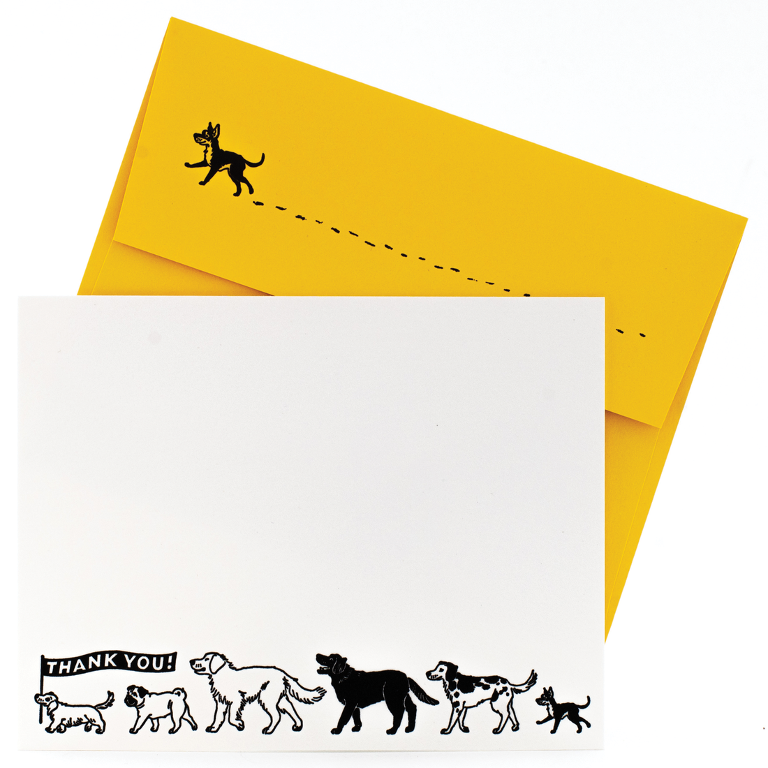 Image of card with white background with line of dogs in black and white with first dog holding a black banner with white text says, “Thank you”. Yellow envelope with image of black dog on back flap. 