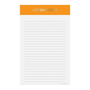 Image of a notepad with white lined paper an orange binding with gold foil text says, “Get Shit Done”. 