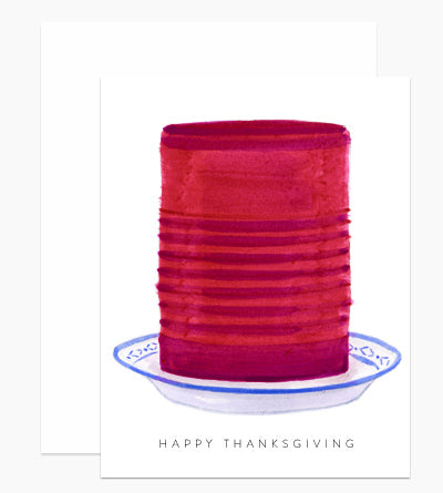 White card with gray text saying, "Happy Thanksgiving". Images of jellied cranberry sauce in a blue and white dish. A white envelope is included.