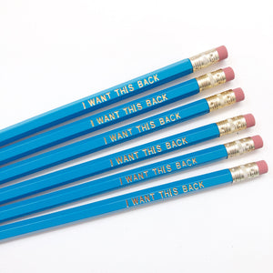 Image of blue pencils with gold foil text says, "I want this back". 