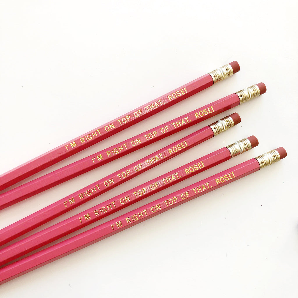 Image of pink pencil with gold foil text says, "I'm right on top of that Rose!".