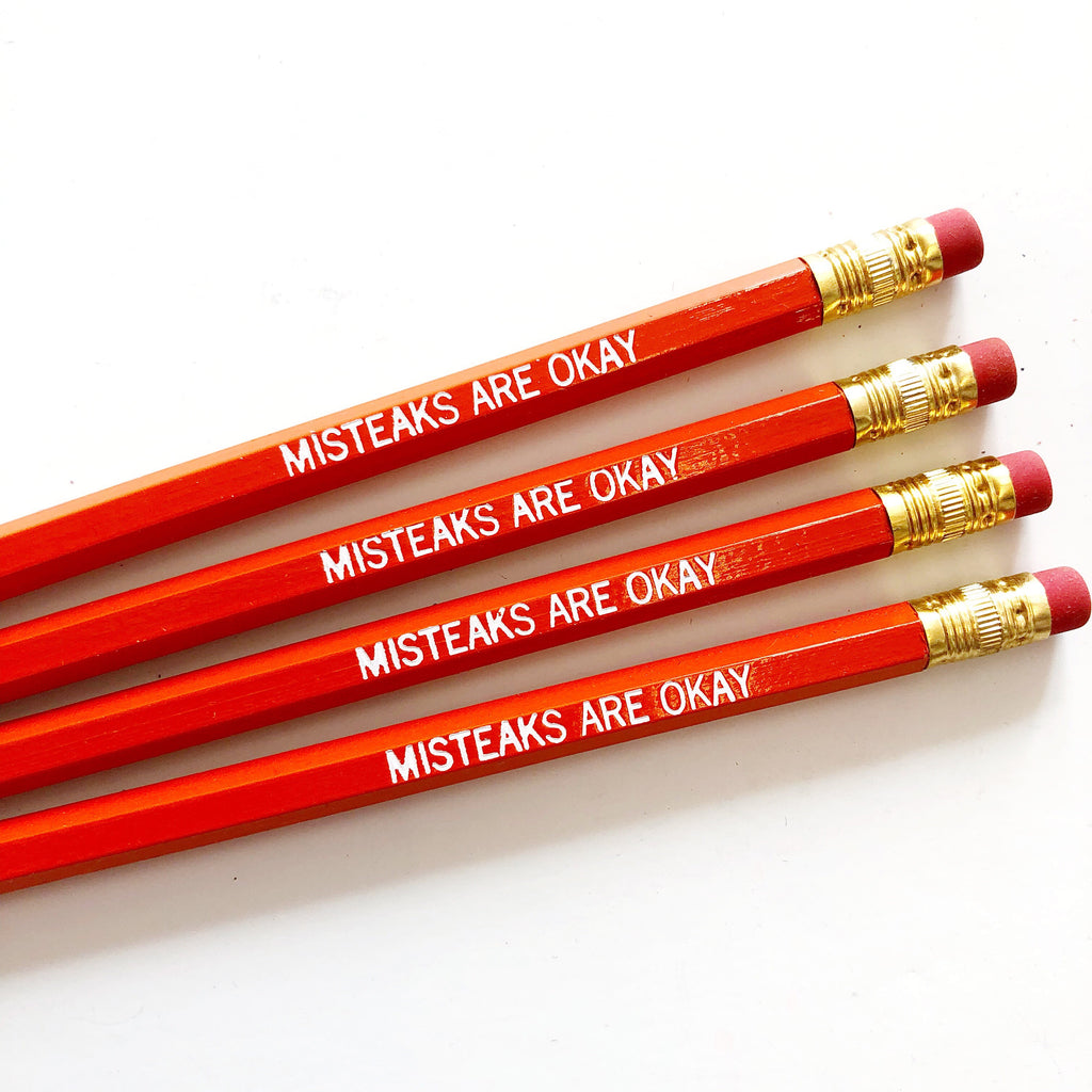 Image of orange pencils with white text says, "Mistakes are okay". 
