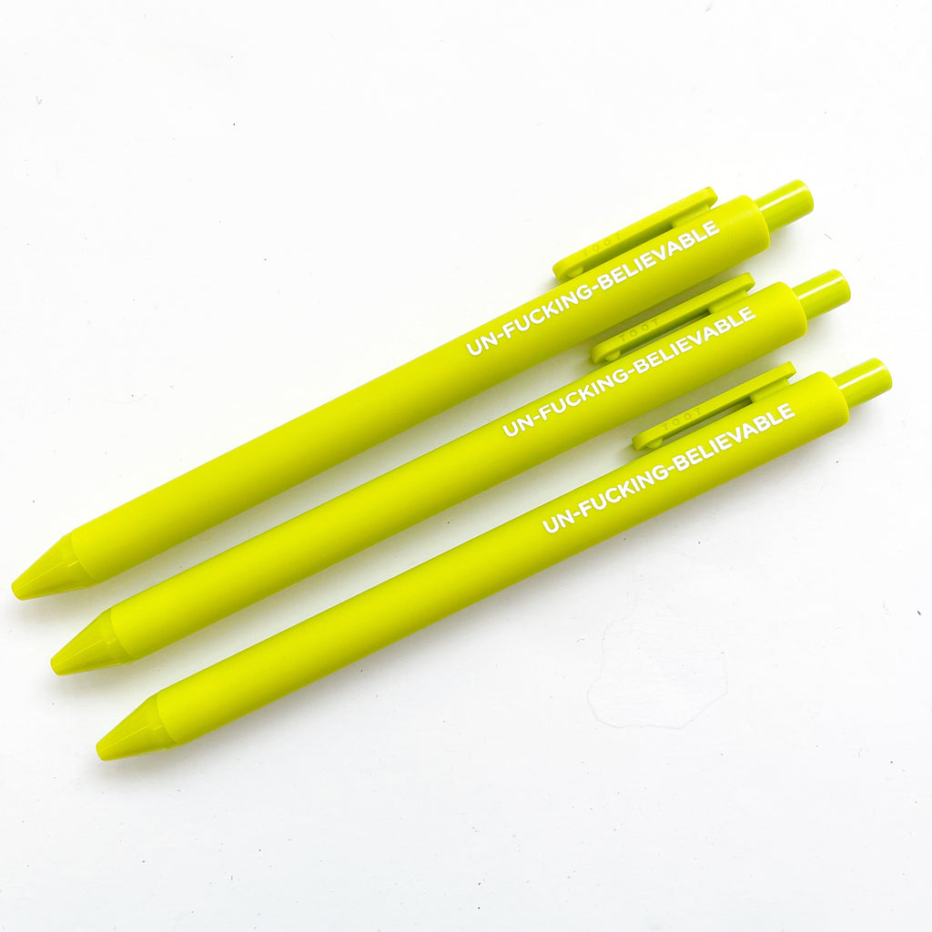 Image of citron colored pens with white text says, "Un-fucking believable". 