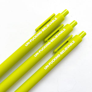 Image of citron colored pens with white text says, "Un-fucking believable".