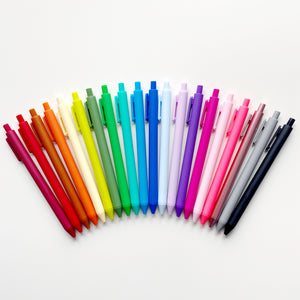 Rainbow of ball point jotter pens. 