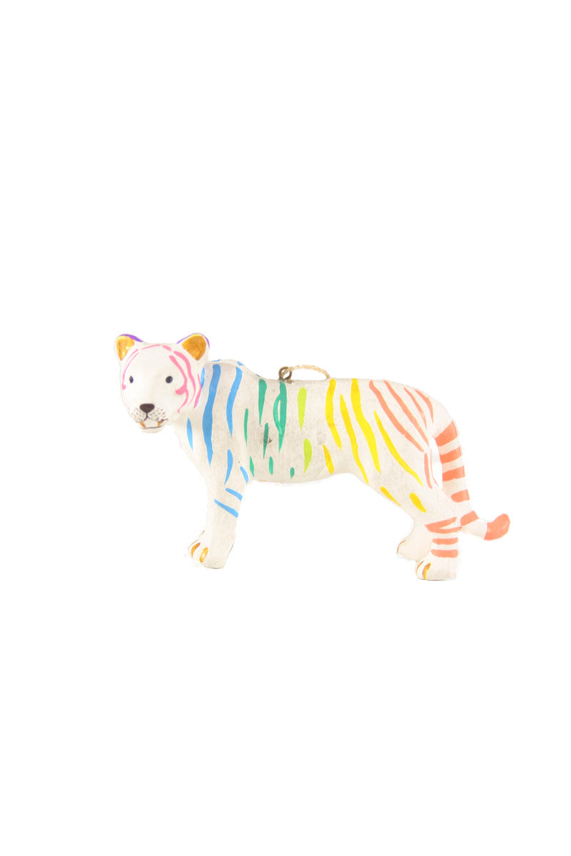 Image of a white tiger with rainbow stripes. 